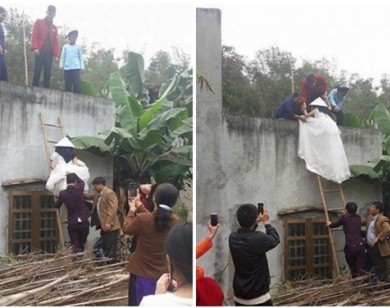 Cô dâu bị nghi 'ăn cơm trước kẻng' phải bắc thang, trèo tường cao 4m để vào nhà chồng và sự thật bất ngờ