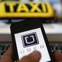 Hà Nội đề xuất gắn phù hiệu, quản lý Uber, Grab như taxi