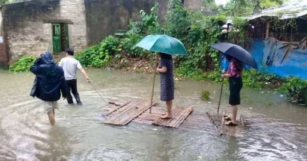 Nữ Chủ tịch phường nói về hình ảnh mặc váy, đi bè tre chống lụt