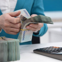Bộ Tài chính chỉ đạo xử lý nghiêm ngân hàng có nhân viên ''ép'' khách hàng mua bảo hiểm