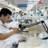 Xuất khẩu dệt may tăng trưởng trong khó khăn