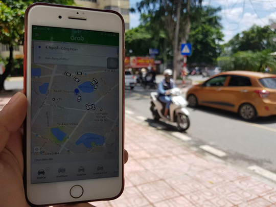 Lái xe Uber, Grab “ngã ngửa” vì bị truy thu thuế - Ảnh 2.