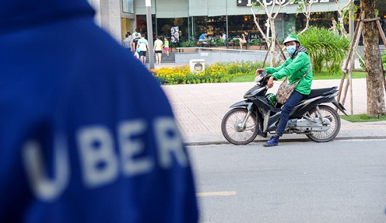 Sẽ tổng kết thí điểm xe Grab và Uber vào tháng 11/2017