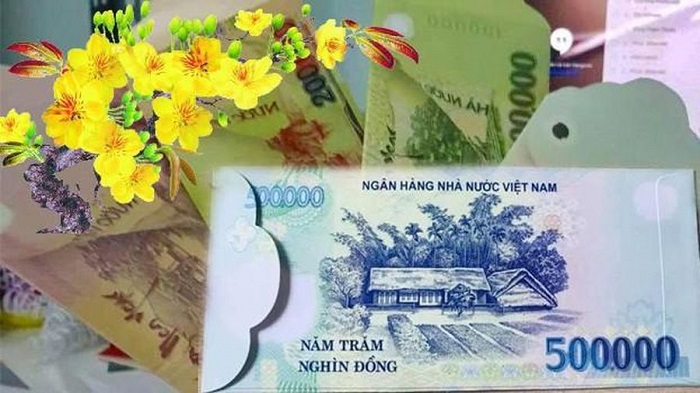 In hình tiền Việt Nam lên bao lì xì, đổi tiền lẻ thu phí là vi phạm pháp luật